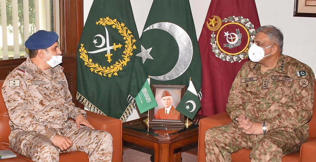 Major General Talal Abdullah Al-Otaibi, military adviser to the Saudi Minister of Defense (left), meets Pakistan's chief of army staff General Qamar Javed Bajwa in Rawalpindi, Pakistan, on January 10, 2022. (ISPR)