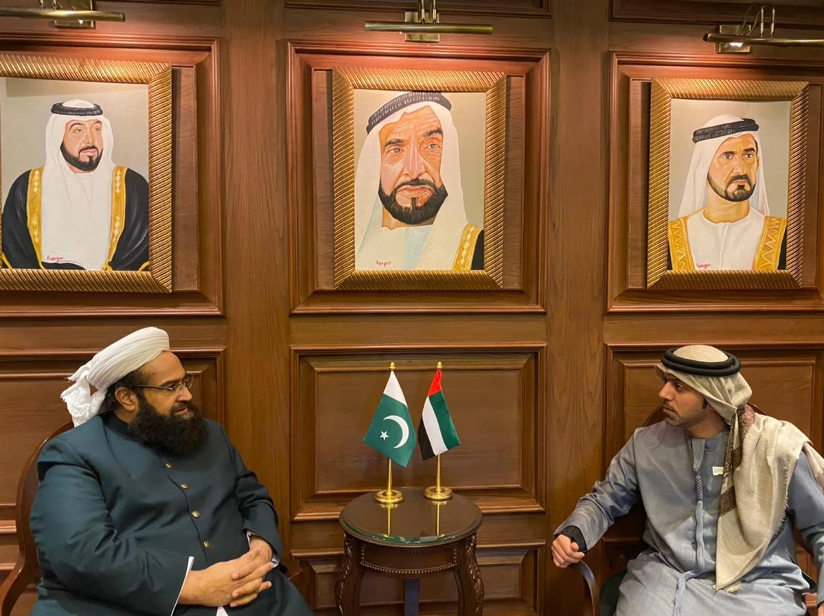Pakistani Prime Minister Imran Khan’s aide on the Middle East Tahir Mahmood Ashrafi speaks to UAE's envoy to Islamabad Hamad Obaid Al-Zaabi in Islamabad on January 18, 2022. (UAE Embassy Pakistan)
