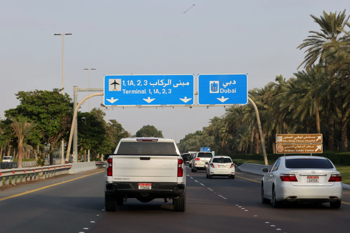 Drivers take a road leading to Abu Dhabi's airport in the capital of the United Arab Emirates, Abu Dhabi, on January 17, 2022. (AFP)