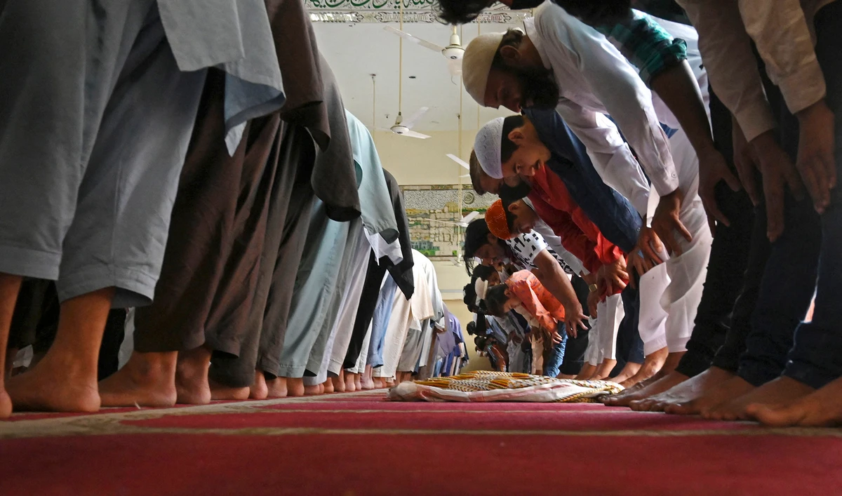 Devotees offer Friday prayers at a mosque during the Muslim holy month of Ramadan in Lahore, Pakistan on April 23, 2021. (AFP/File)