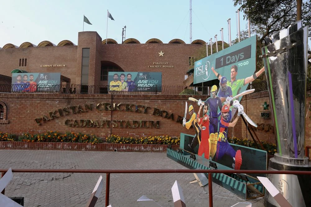 Cutouts of cricket players display outside the Gaddafi Stadium for the upcoming country's premier domestic Twenty20 tournament 'Pakistan Super League' in Lahore, Pakistan, Tuesday, Jan. 25, 2022. (AP)