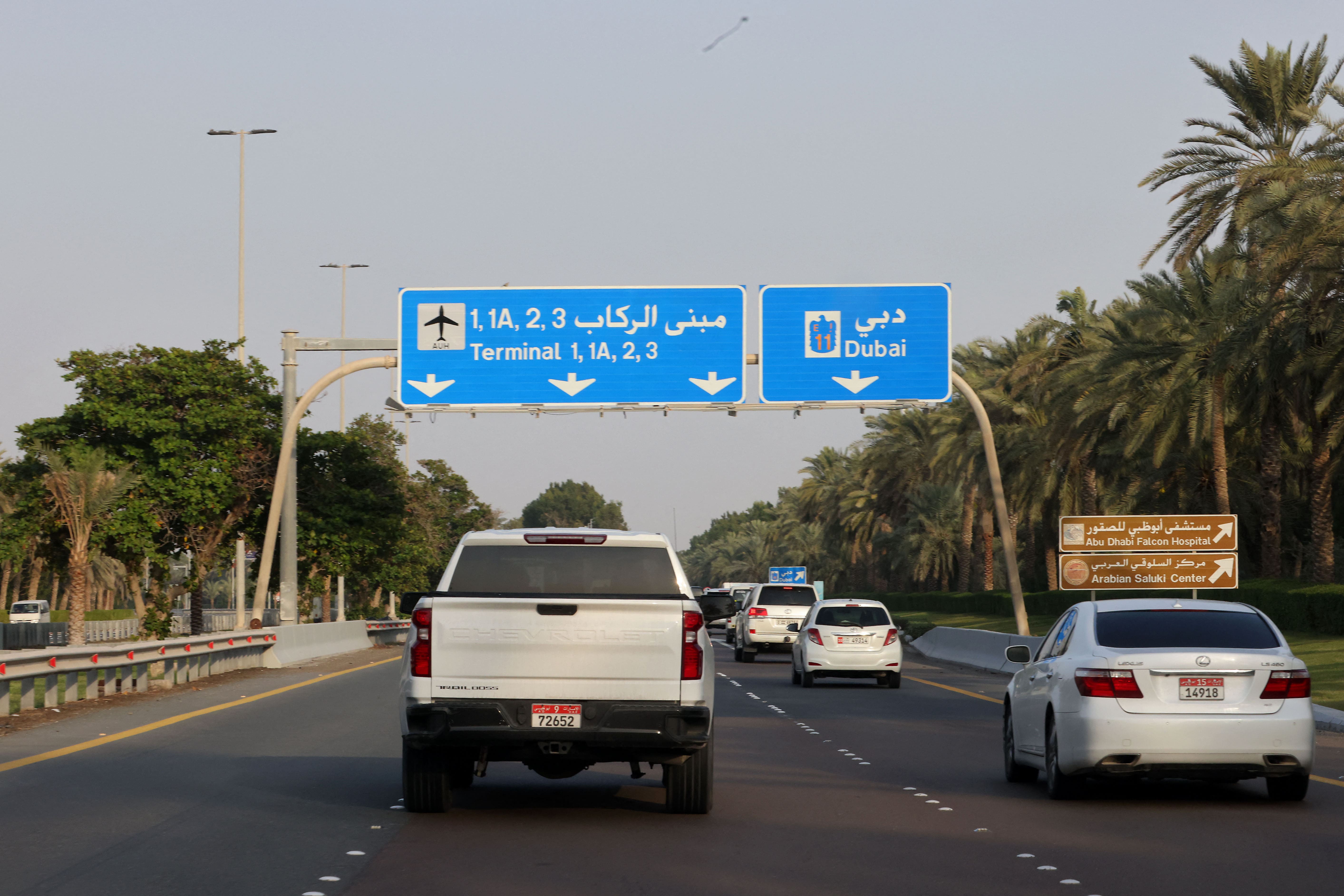 Drivers take a road leading to Abu Dhabi's airport in the capital of the United Arab Emirates, Abu Dhabi, on January 17, 2022. (AFP)