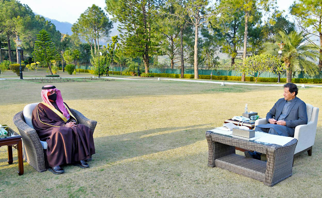 Saudi Interior Minister Prince Abdulaziz bin Saud bin Naif (left) calls on Prime Minister of Pakistan Imran Khan in Islamabad, Pakistan, on February 7, 2022. (Prime Minister Office/Twitter)
