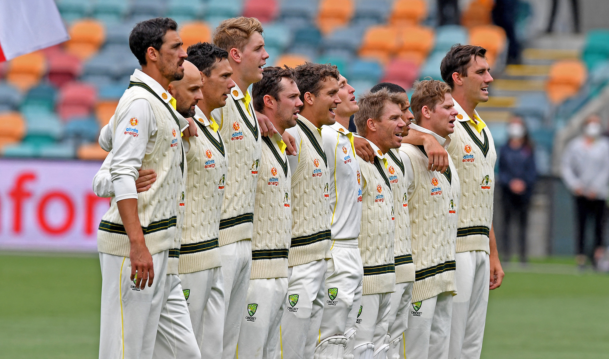 The Australian team sings the national anthem on the first day of the fifth Ashes cricket Test match against England in Hobart on January 14, 2022. (AFP)
