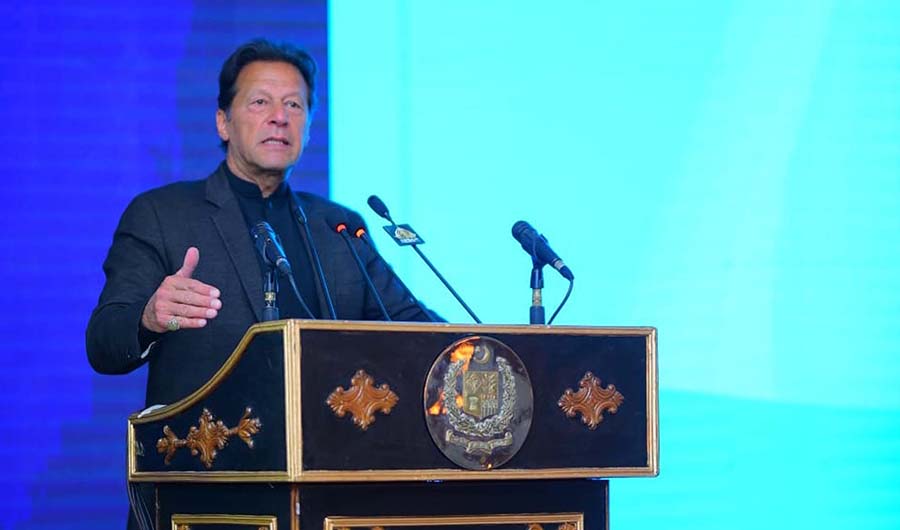 Pakistani Prime Minister Imran Khan addressing the international symposium on Pakistan's hydropower development in Islamabad on Feb 14, 2022. (PID)