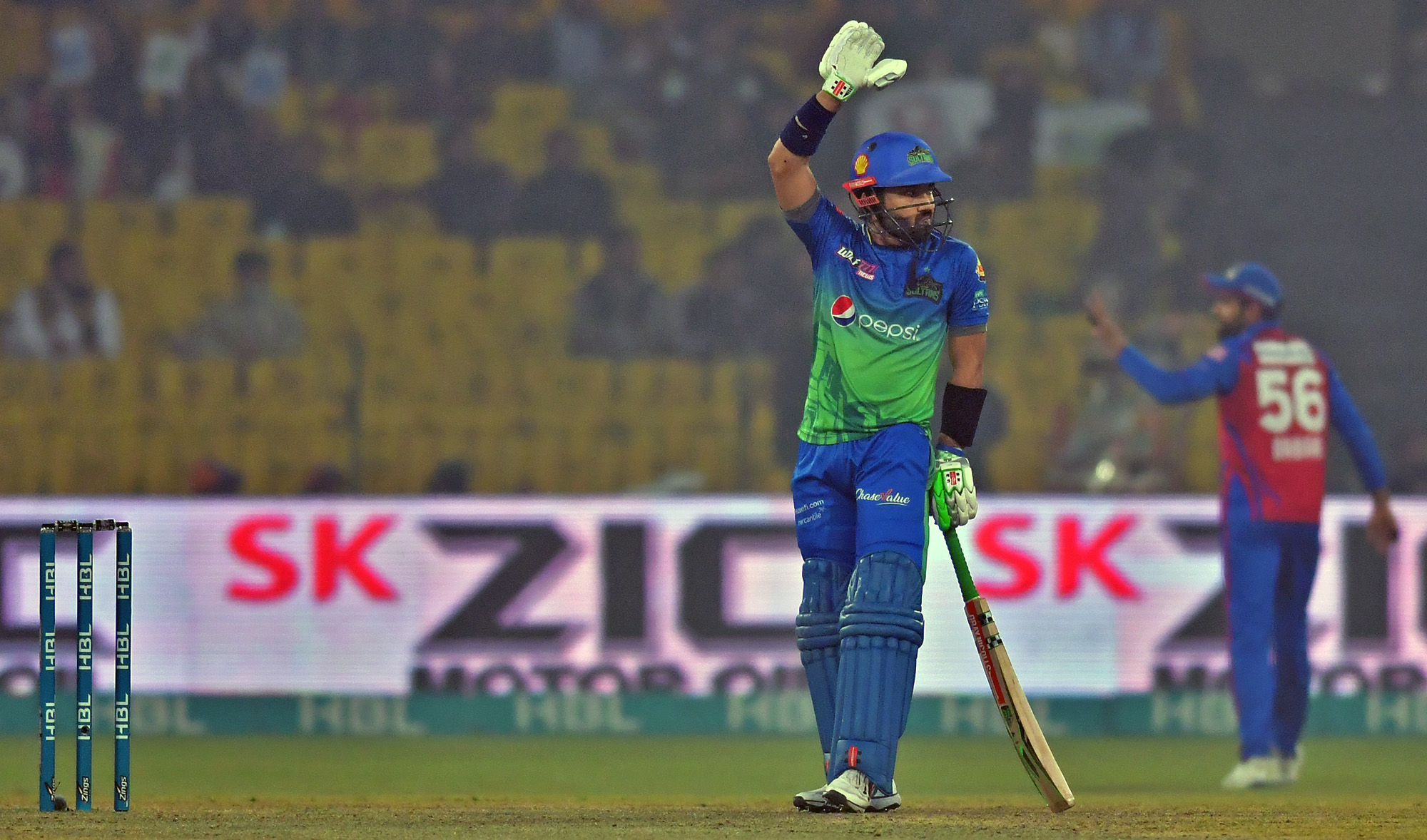Multan Sultans' captain Mohammad Rizwan, left, and Karachi Kings' skipper Babar Azam during a Pakistan Super League cricket match at the Gaddafi Stadium in Lahore, Pakistan on February 16, 2022. (Photo courtesy: Pakistan Cricket Board)