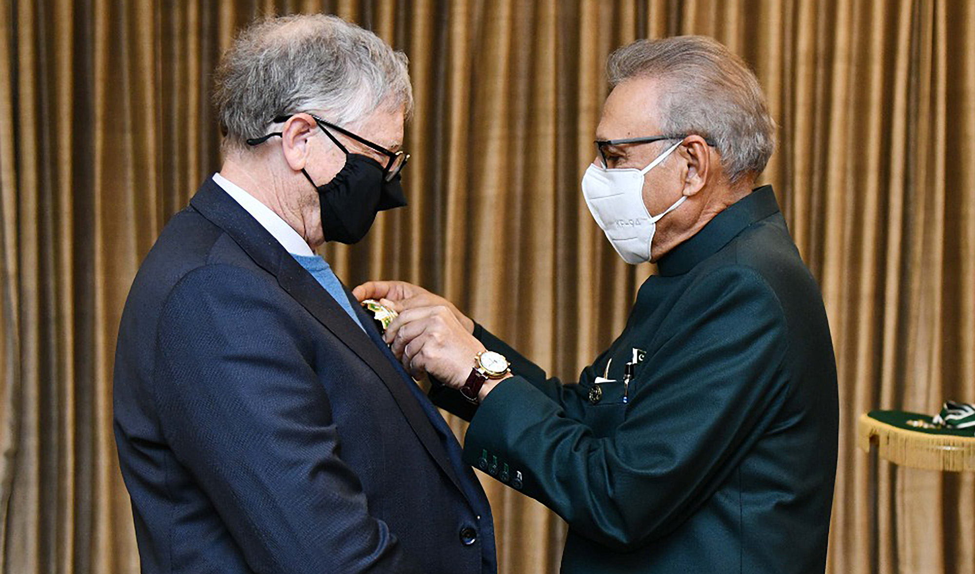 Pakistan President Arif Alvi confers country's top civilian award, Hilal-e-Pakistan, upon Microsoft cofounder and philanthropist Bill Gates in Islamabad on February 17, 2022. (Photo courtesy: @PresOfPakistan/Twitter)