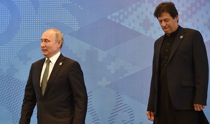 Russian President Vladimir Putin and Pakistani Prime Minister Imran Khan at the Shanghai Cooperation Organization's Council of Heads of State meeting in Bishkek, Kyrgyzstan, on June 14, 2019. (AFP/File)