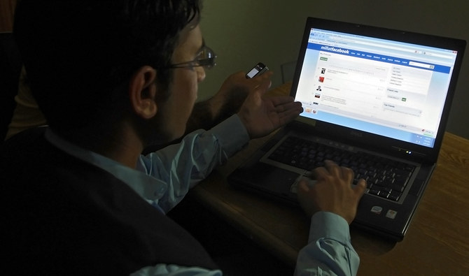 In this file photo, an IT professional browses Facebook in Lahore on May 27, 2010. (AFP)