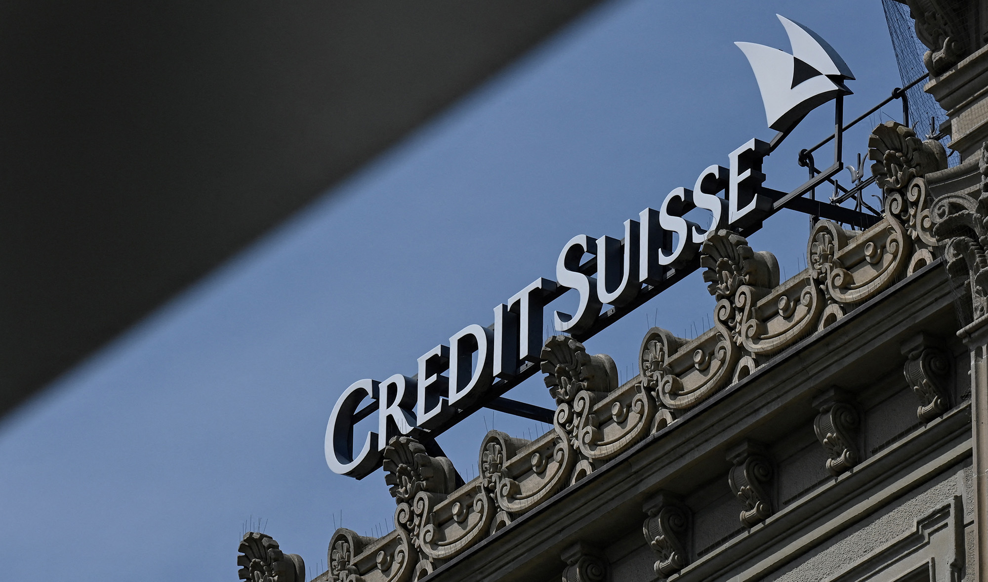 This picture shows the front entrance of the headquarters of Swiss bank Credit Suisse in Zurich on August 9, 2021. (AFP/File)