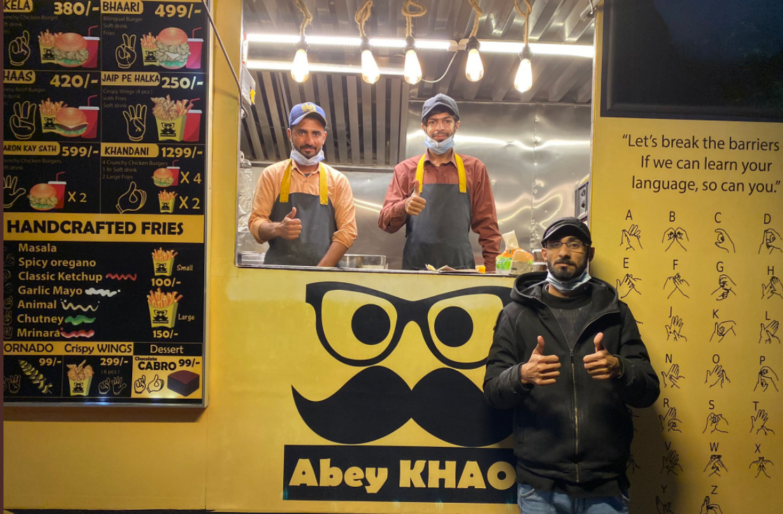 In this undated photo, staffers pose in front of Pakistan's first mobile restaurant, Abey Khao. (Photo courtesy: Social Media)