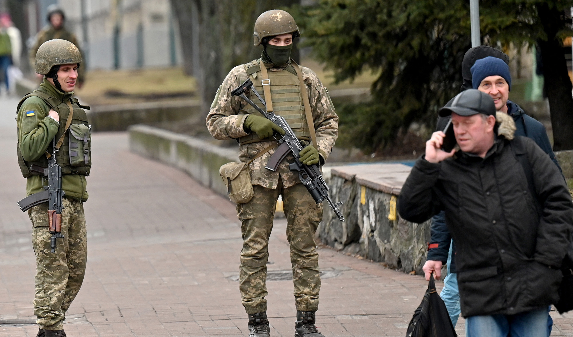 Ukrainian Military Forces servicemen stand guard in Kyiv on February 24, 2022 as Russia's ground forces invaded Ukraine from several directions. (AFP/File)