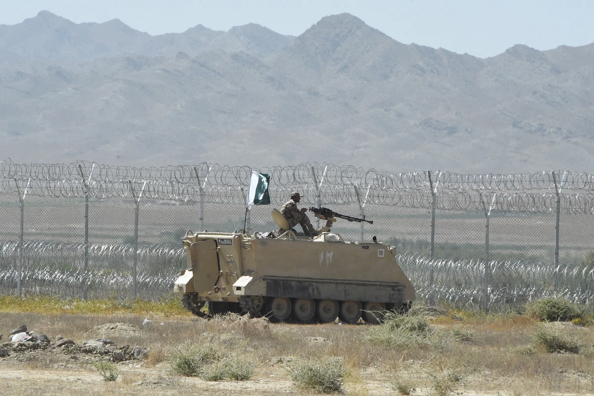 A security personnel of Pakistan's Frontier Corps stands on an armoured vehicle near the newly inaugurated Badini Trade Terminal Gateway, a border crossing point between Pakistan and Afghanistan at the Pakistan's border town of Qila Saifullah in the southwestern province of Balochistan on September 16, 2020. (AFP/ File)