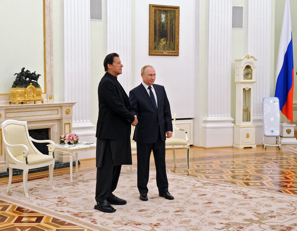 Russian President Vladimir Putin meets with Pakistan's Prime Minister Imran Khan at the Kremlin in Moscow on February 24, 2022. (AFP)