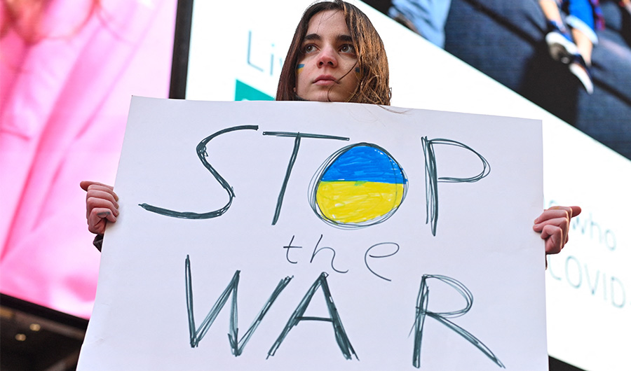 Hundreds of people gather for a "Stand With Ukraine" rally in Times Square on February 26, 2022, in New York City. (AFP)