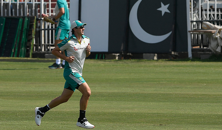 Australia's captain Pat Cummins warms up during a practice session at the Rawalpindi Cricket Stadium in Rawalpindi on March 2, 2022. (AFP)