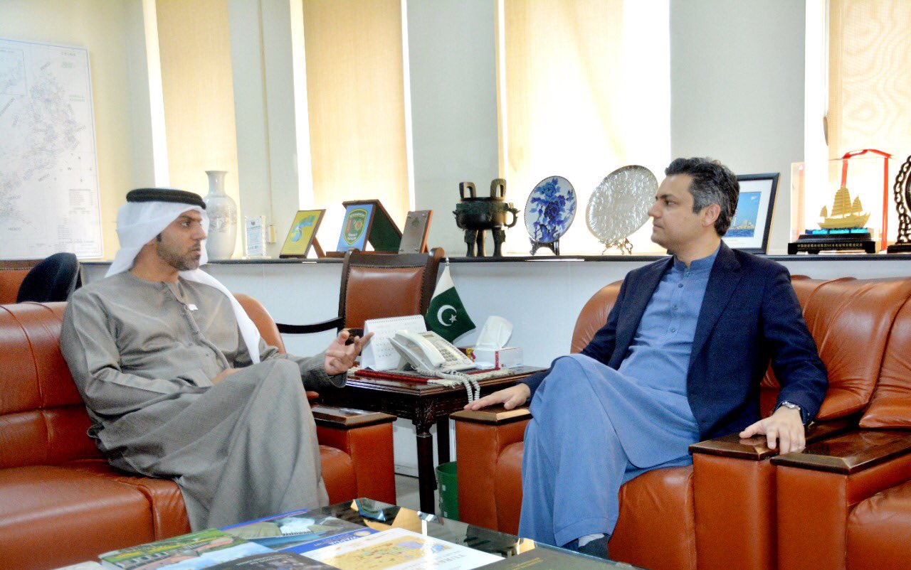 UAE Ambassador to Pakistan, Hamad Obaid Al-Zaabi, left, calls on Pakistani minister for energy, Hammad Azhar, in Islamabad on March 8, 2022. (Photo courtesy: @Official_PetDiv/Twitter)