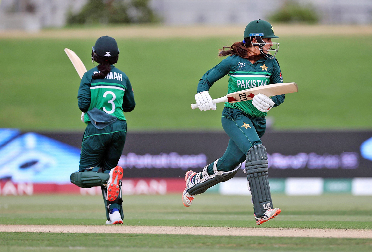Pakistan's Bismah Maroof and Aliya Riaz run between the stumps during the two group-stage matches at the Women’s Cricket World Cup against Australia in Mount Maunganui, New Zealand, on March 8, 2022. (ICC/Twitte)