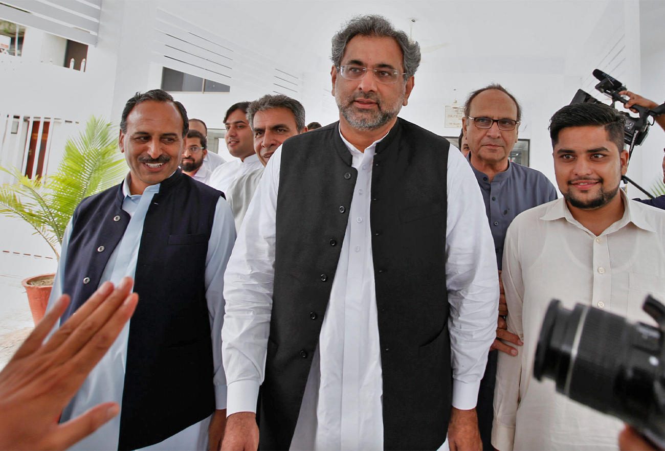 Pakistan's former prime minister, Shahid Khaqan Abbasi, center, is pictured outside Parliament in Islamabad, Pakistan, on August 15, 2017. (AP/File)