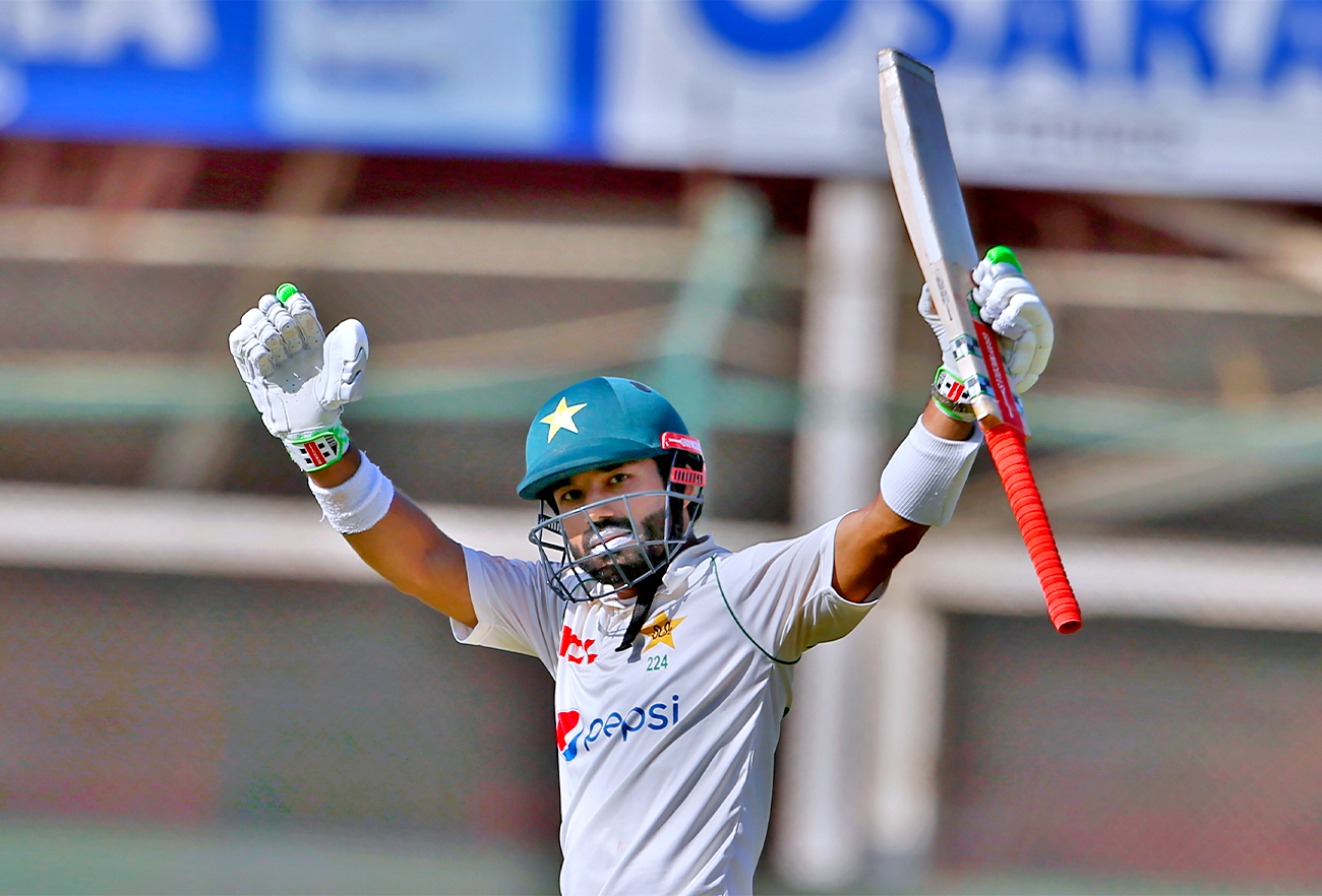 Pakistan's Mohammad Rizwan celebrates after completing 50 runs on the fifth day of the second test match between Pakistan and Australia at the National Stadium in Karachi Pakistan, on March 16, 2022. (AP)