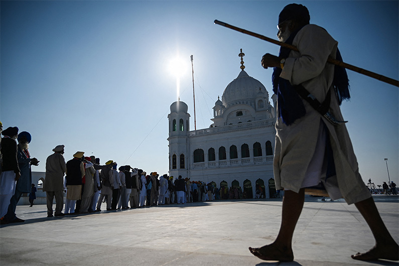Sikh pilgrims stand in a queue to visit the Shrine of Baba Guru Nanak Dev at Gurdwara Darbar Sahib in Kartarpur, near the Indian border, on November 9, 2019. (AFP/FILE)