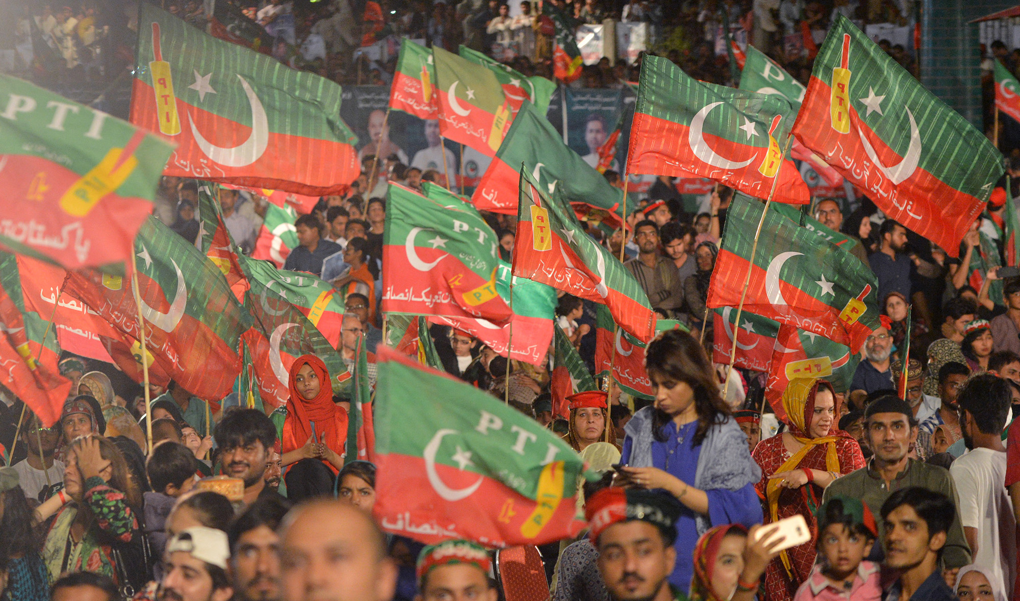 Supporters of Pakistan Prime Minister Imran Khan attend an election campaign rally ahead of the general election in Karachi on July 22, 2018. (AFP/File)
