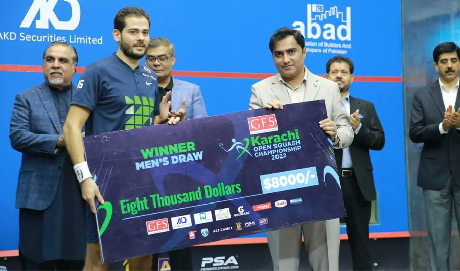 Egyptian squash player Karim Abdel Gawad (2nd from L) receives a prize after winning the Men's Karachi Open Squash Championship held in Karachi, Pakistan on March 19, 2022. (Photo courtesy: social media)