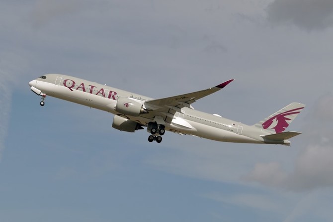 File photo from September 27, 2019 shows an Airbus A350 of Qatar Airways company after taking off from the Toulouse-Blagnac airport, near Toulouse. (AFP/FILE)