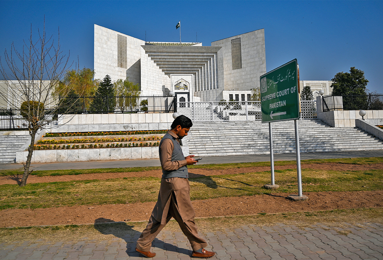 A man walks past the Supreme Court building in Islamabad, Pakistan, on January 29, 2021. (AFP/File)