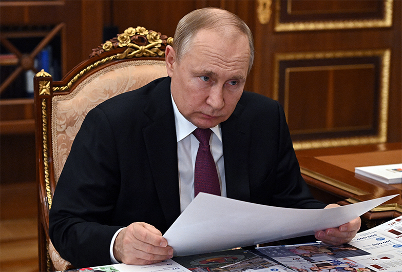 Russian President Vladimir Putin meets with Governor of Russia's Yamalo-Nenets Autonomous Region Dmitry Artyukhov at the Kremlin in Moscow on March 21, 2022. (AFP)