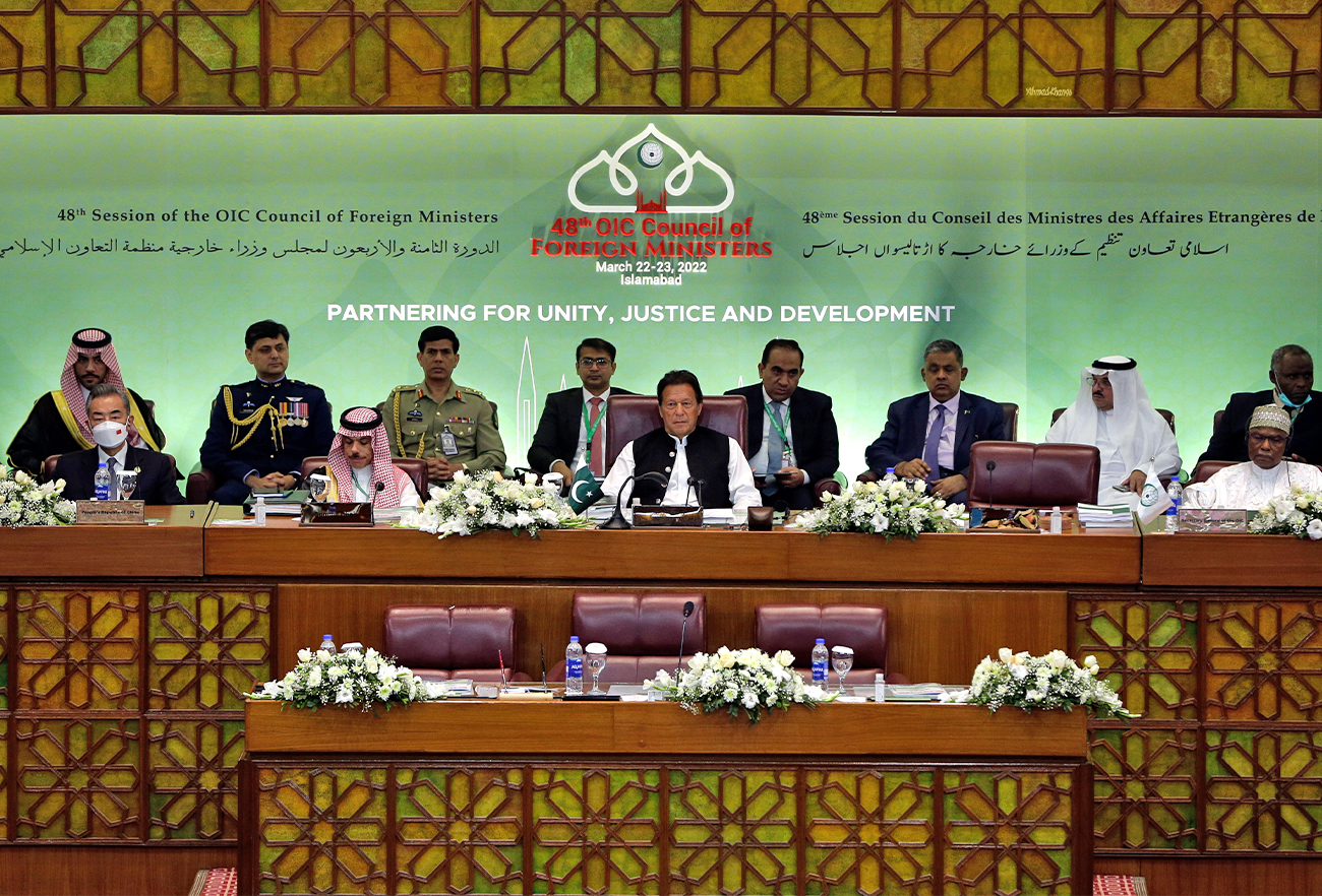 Pakistan's Prime Minister Imran Khan, center, attend at the start of a two-day gathering of the 57-member Organization of Islamic Cooperation, at the Parliament House in Islamabad, Pakistan, on March 22, 2022. (AP)