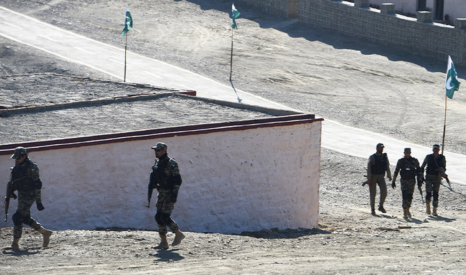 Pakistani army soldiers walk near a border terminal in Ghulam Khan, a town in North Waziristan, on the border between Pakistan and Afghanistan, on January 27, 2019. (AFP/File)