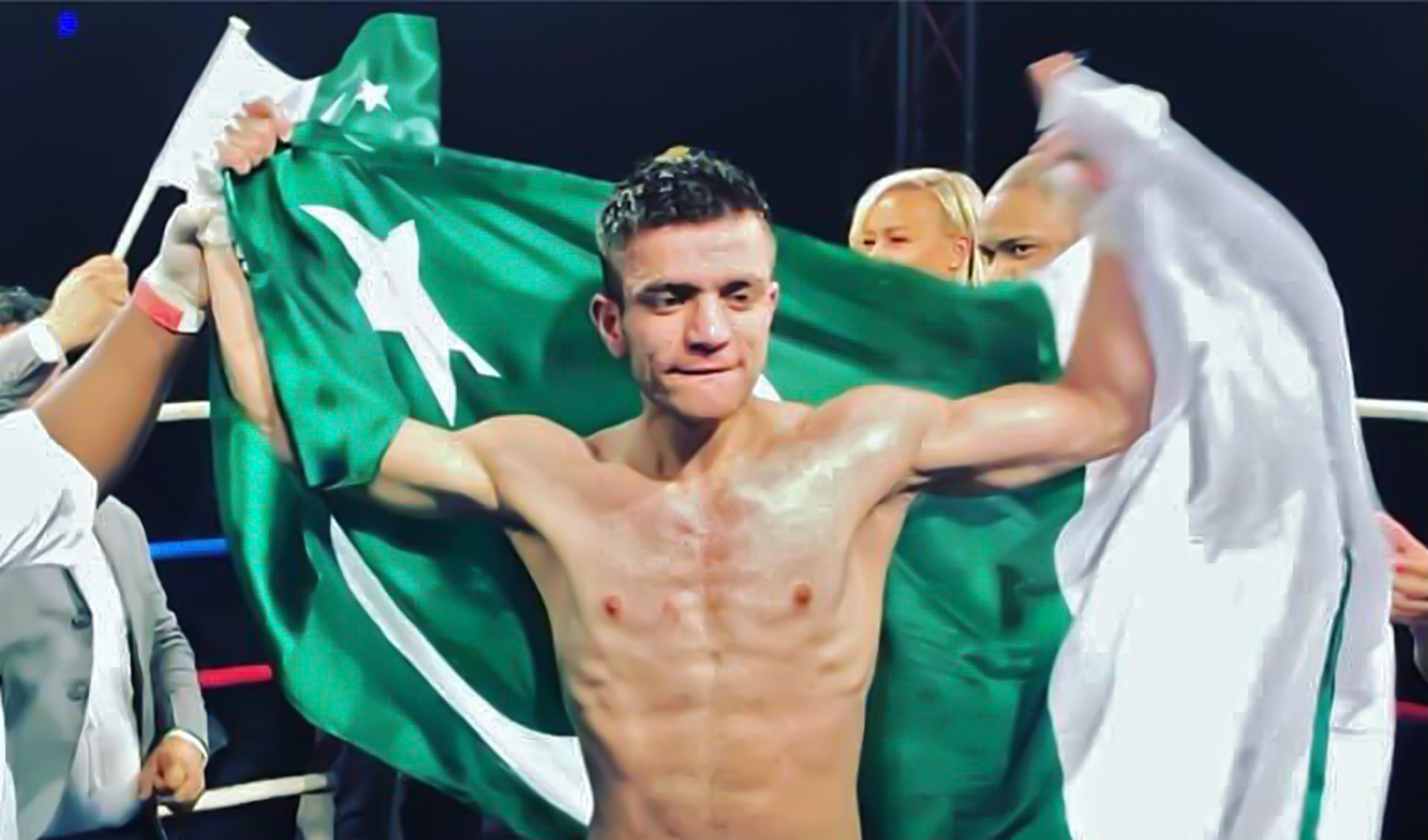 Pakistani Boxer Usman Wazeer celebrates after defeating Tanzania's Roasta in Dubai on December 16, 2022. (Photo courtesy: @WazeerUsman/Twitter)