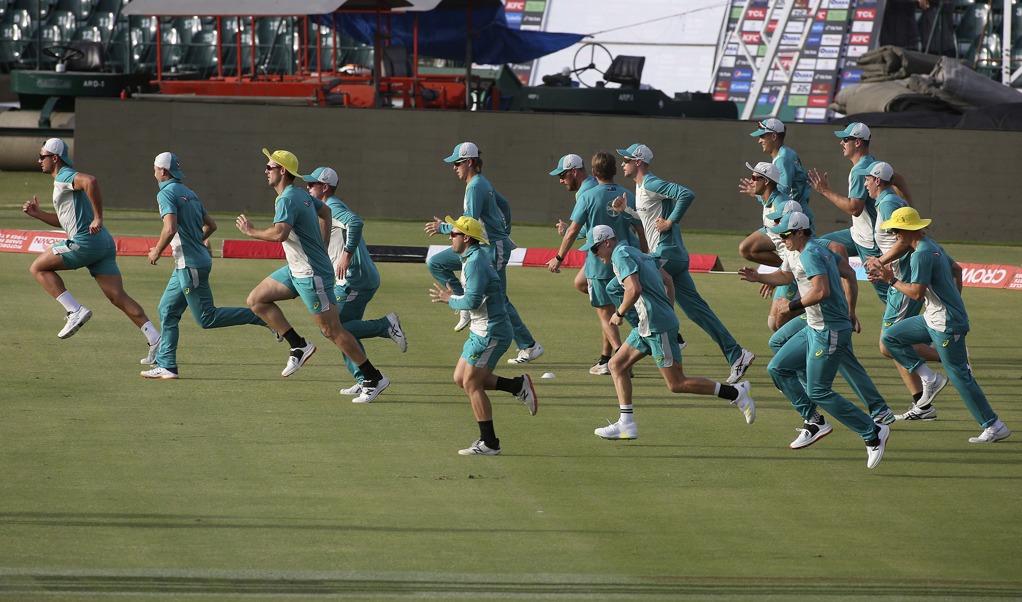 Australian players warm up during a training session at Gaddafi Stadium in Lahore, Pakistan, Sunday, March 27, 2022. Australia and Pakistan will play their first One Day International cricket match on March 29. (AP)