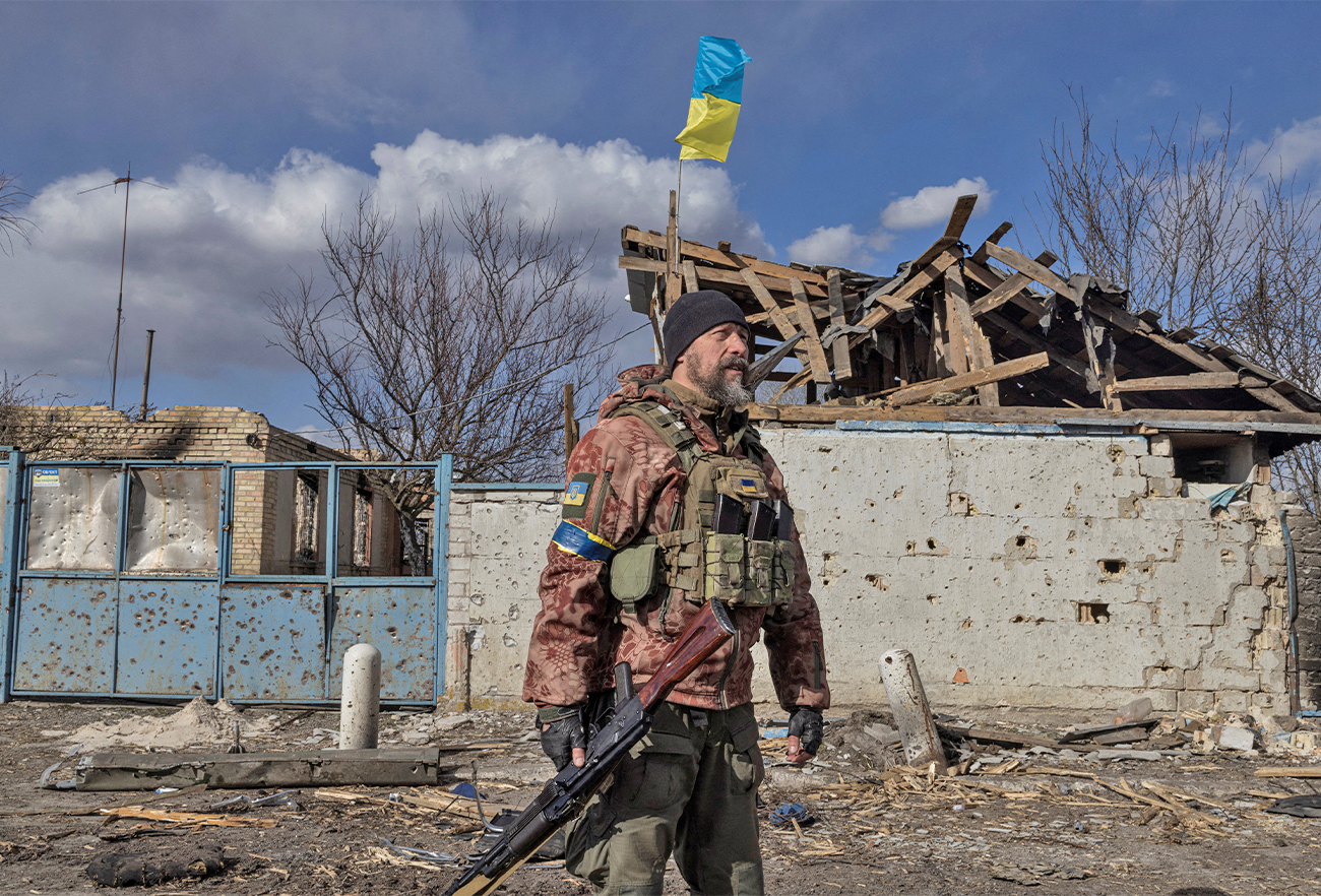 A Ukrainian serviceman stands in the village of Lukyanivka outside Kyiv, as Russia's invasion of Ukraine continues, Ukraine, on March 27, 2022. (AFP)