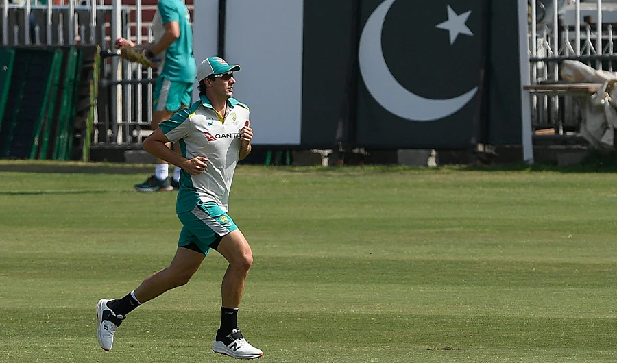 Australia's captain Pat Cummins warms up during a practice session at the Rawalpindi Cricket Stadium in Rawalpindi on March 2, 2022. (AFP)