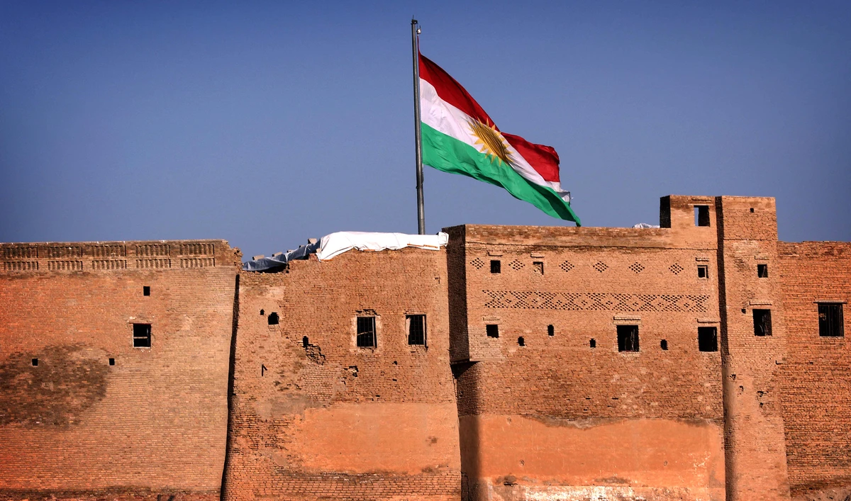 Kurdish flag waving over the Erbil Citadel in the capital of the autonomous Kurdish region of northern Iraq on February 3, 2016. (AFP/File)
