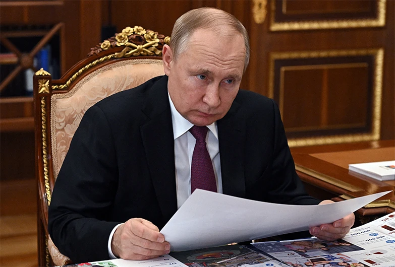 Russian President Vladimir Putin meets with Governor of Russia's Yamalo-Nenets Autonomous Region Dmitry Artyukhov at the Kremlin in Moscow on March 21, 2022. (AFP)
