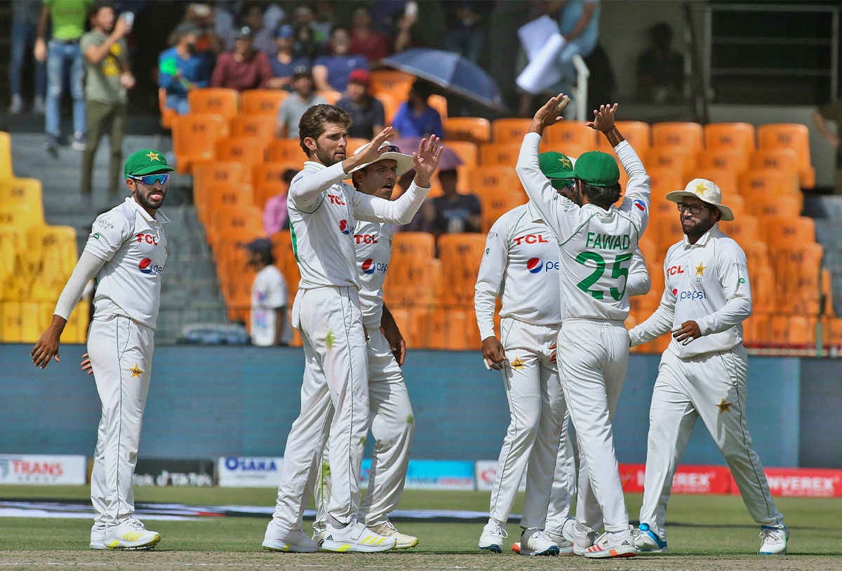 Pakistan's Shaheen Shah Afridi, second left, celebrates with teammates after taking the wicket of Australia's Mitchell Starc on the second day play of the third test match between Pakistan and Australia in Lahore, Pakistan, on March 22, 2022. (AP)