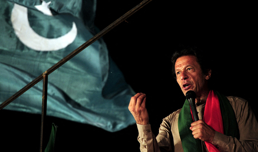 This file photo taken on September 1, 2014 shows Pakistani cricketer-turned-politician Imran Khan addressing supporters during an anti-government protest near the prime minister's residence in Islamabad. (AFP/FILE)