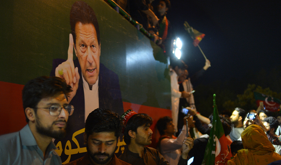 Supporters of Pakistan Tehreek-e-Insaf (PTI) party of dismissed Pakistan's Prime Minister Imran Khan, take part in a rally in his support in Islamabad on April 10, 2022. (AFP)