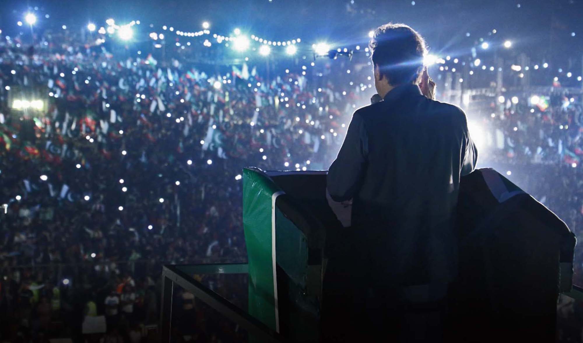 Former prime minister Imran Khan addresses a public gathering of his Pakistan Tehreek-e-Insaf (PTI) party in Karachi on April 17, 2022. (Photo courtesy: @PTIofficial/Twitter)