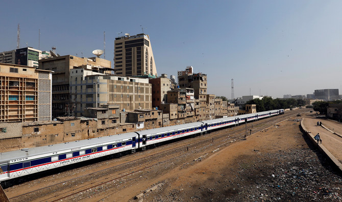 The Karachi Circular Railway (KCR) inner-city train service, which was discontinued in 1999, moves past after its inauguration in Karachi on November 19, 2020. (REUTERS/File)