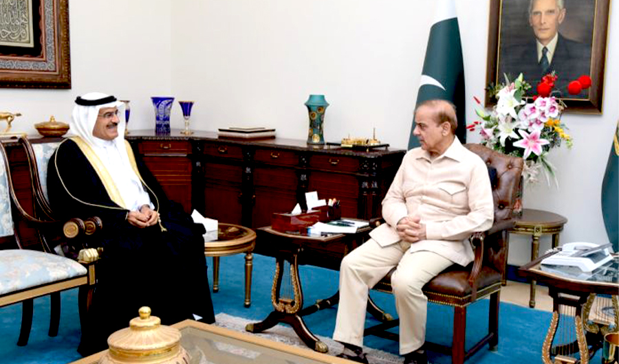 Pakistan's Prime Minister Shehbaz Sharif (R) meets Bahrain’s Ambassador to Pakistan Mohammed Ebraheem Mohammed (L) in Islamabad on April 20, 2022. (APP)