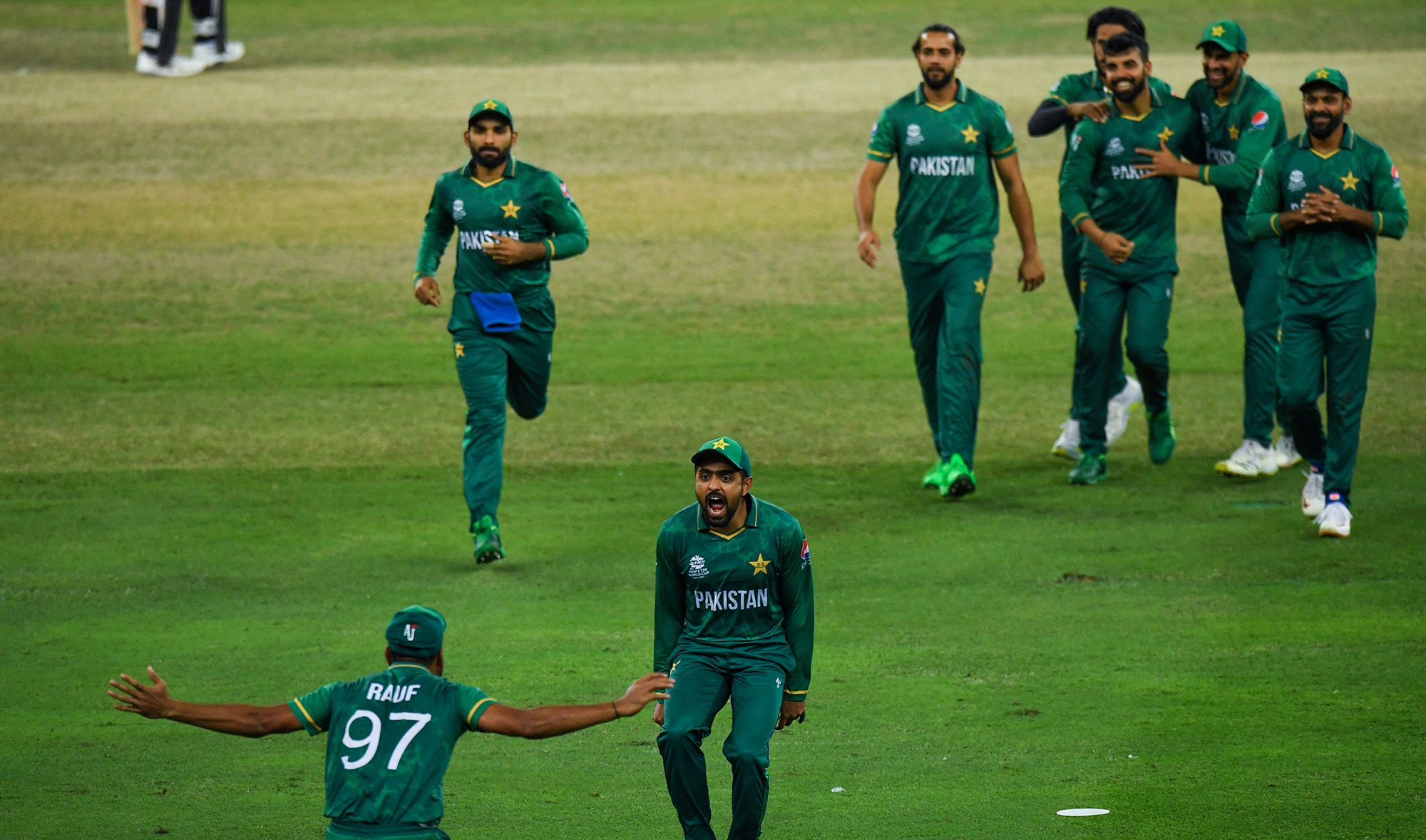 Pakistan's cricketers celebrate the dismissal of Australia's Glenn Maxwell during the ICC men’s Twenty20 World Cup semi-final match at the Dubai International Cricket Stadium in Dubai, UAE, on November 11, 2021. (AFP/File)