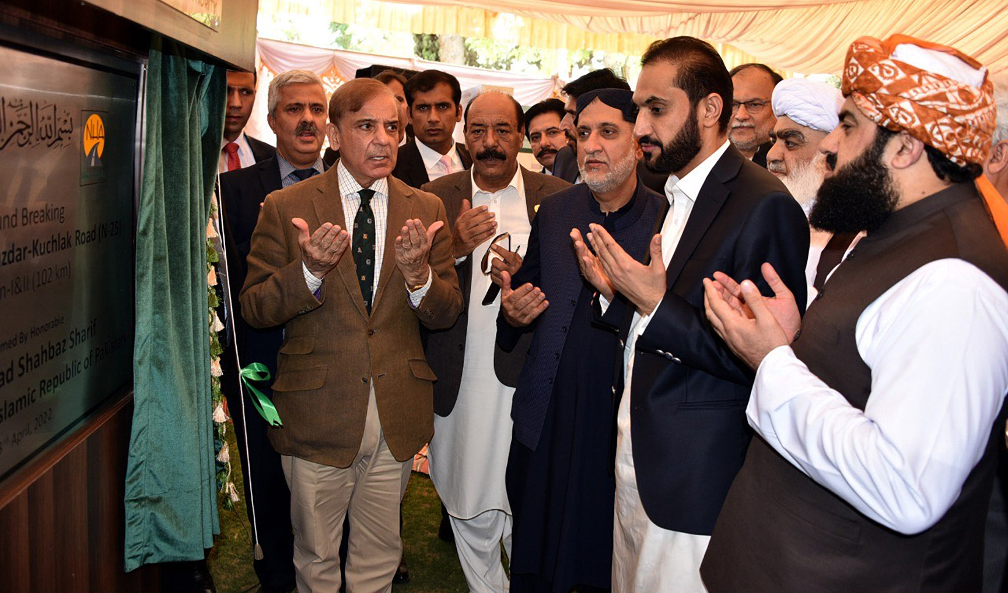 Pakistan's Prime Minister Shehbaz Sharif, front left, inaugurates construction of the Khuzdar-Kuchlak highway in Quetta on April 23, 2022. (PID)