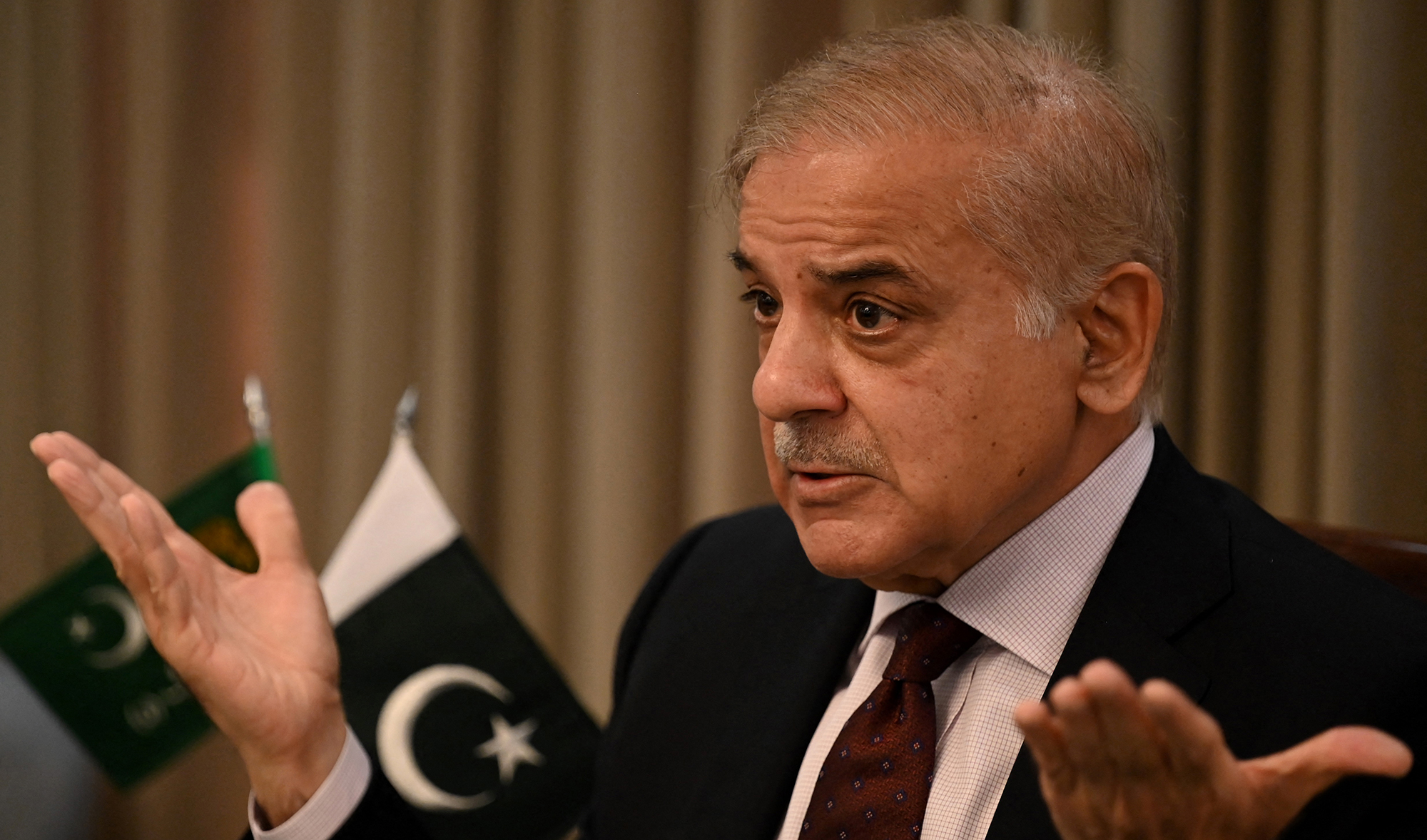 Pakistan Prime Minister Shehbaz Sharif gestures as he speaks during a news conference in Islamabad on April 1, 2022. (AFP/File)