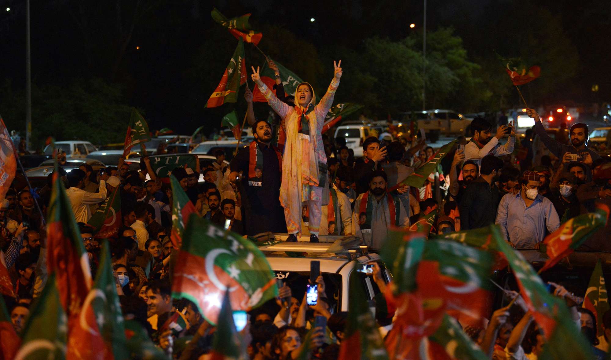 Supporters of Pakistan Tehreek-e-Insaf (PTI) party of dismissed Pakistan's Prime Minister Imran Khan, take part in a rally in his support in Islamabad on April 10, 2022. (AFP/File)
