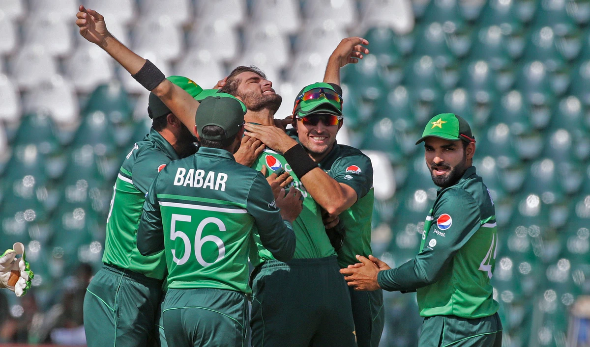 Pakistan's Shaheen Shah Afridi, center, and teammates celebrate after the dismissal of Australia's Travis Head during the third one day international cricket match at Gaddafi Stadium in Lahore, Pakistan on April 2, 2022. (AP)
