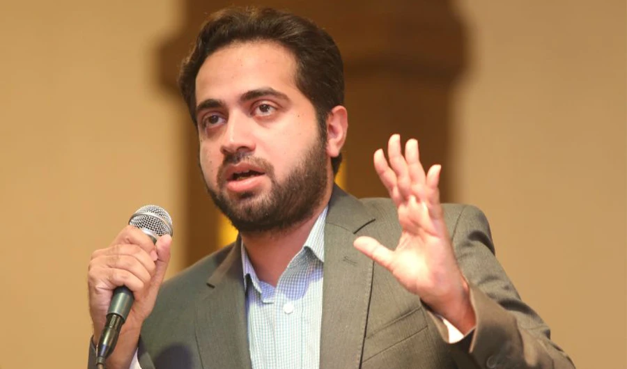 This undated photo shows Dr. Arslan Khalid, a focal person to former prime minister Imran Khan on digital media speaks in an event. (Social Media/FILE)
